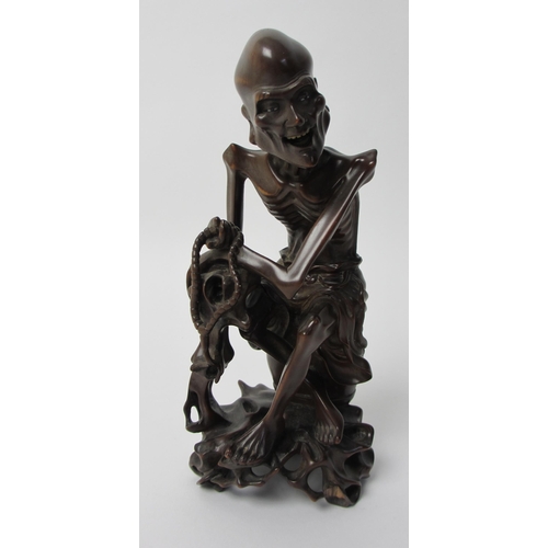 268 - A Chinese carved wood figure of a Senin