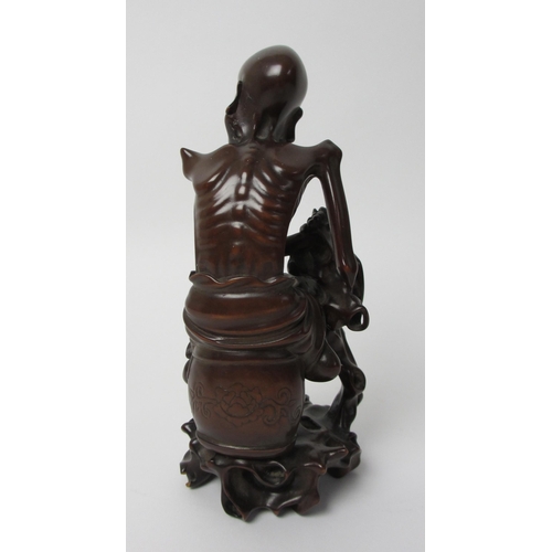 268 - A Chinese carved wood figure of a Senin