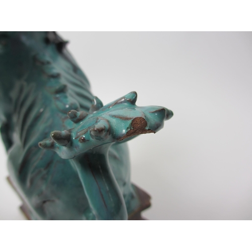 276 - A Chinese turquoise glazed pottery dog of fo