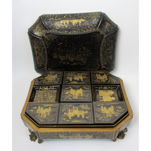 278 - A Chinese export black and gold lacquered octagonal shaped games box