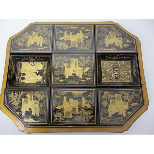 278 - A Chinese export black and gold lacquered octagonal shaped games box