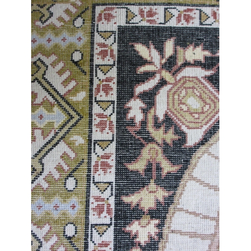 313 - A silk embroidered rug