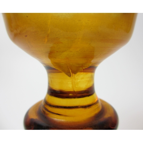 483 - A pair of Bohemian amber and engraved glass covered vases