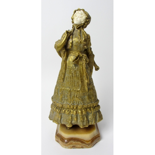 488 - Margriet  A bronze and ivory figure of a Victorian lady