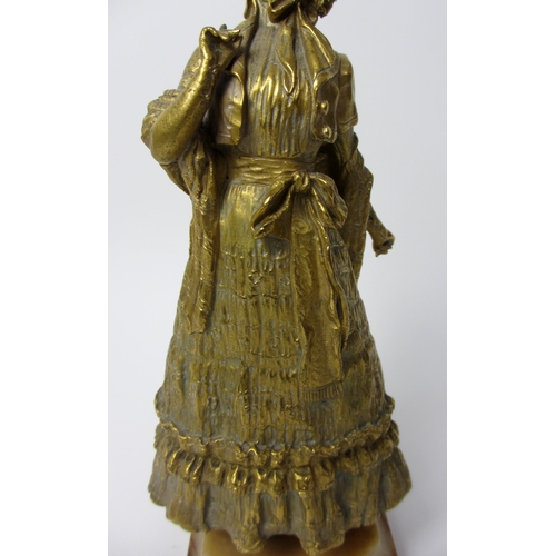 488 - Margriet  A bronze and ivory figure of a Victorian lady