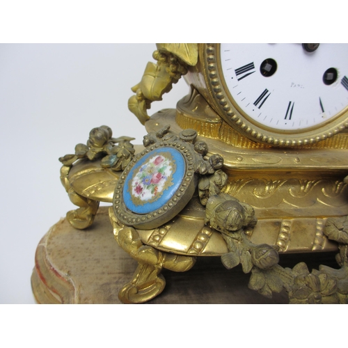 489 - A French gilt metal mantle clock