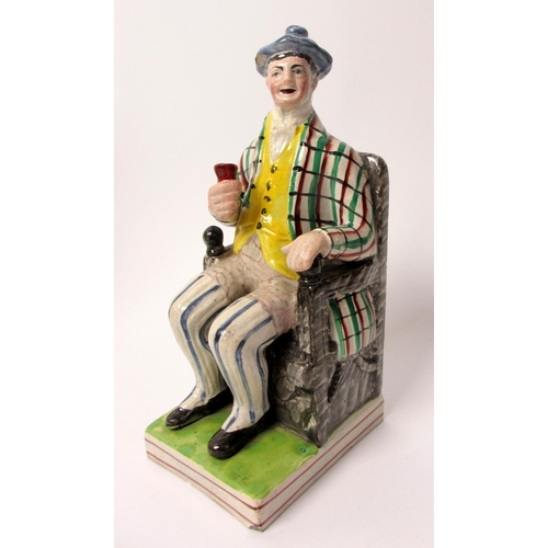 503 - A model of Tam O'Shanter seated on a chair