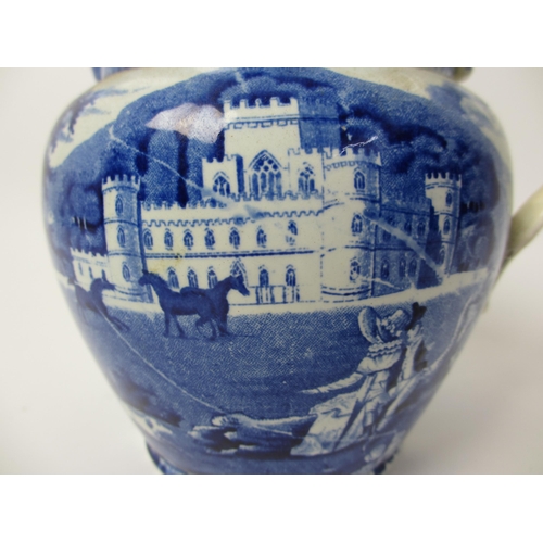 506 - A blue and white jug printed with views of Inveraray Castle