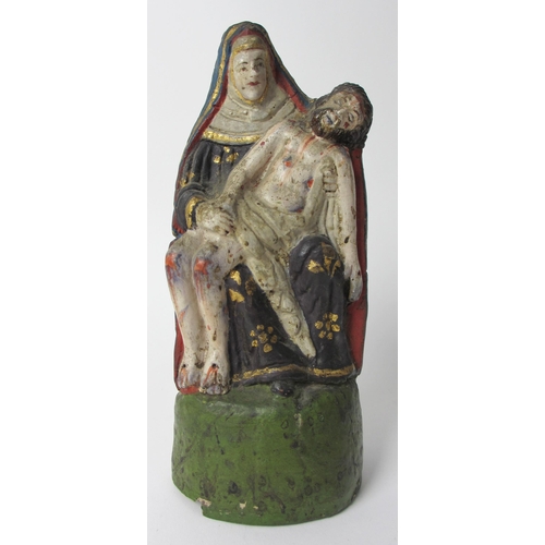 510 - A painted ivory figure of the Madonna and Child