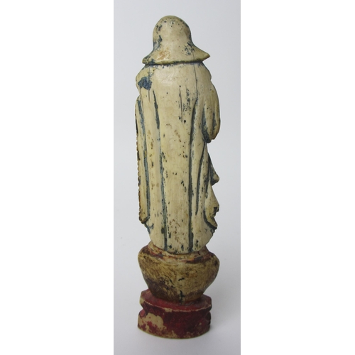 510 - A painted ivory figure of the Madonna and Child