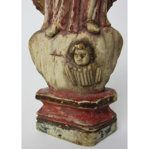 510 - A painted ivory figure of the Madonna and Child