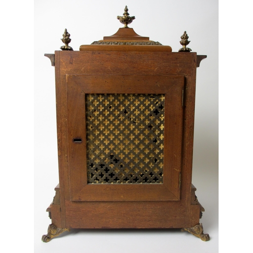 514 - A German walnut cased mantel clock