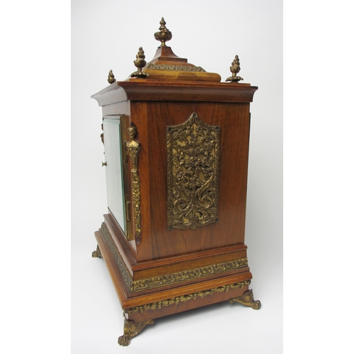 514 - A German walnut cased mantel clock