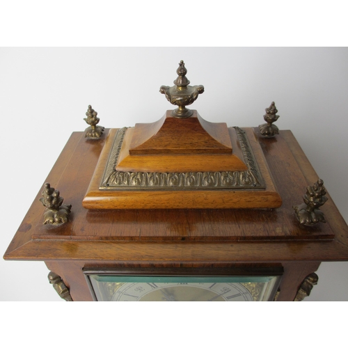 514 - A German walnut cased mantel clock