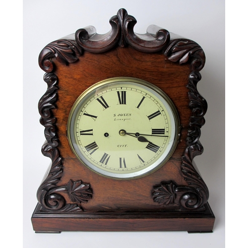 516 - A mid Victorian rosewood bracket clock and bracket