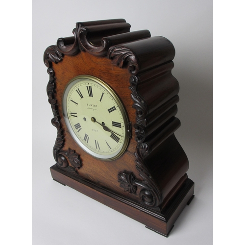 516 - A mid Victorian rosewood bracket clock and bracket