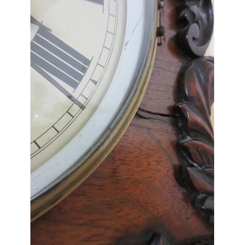 516 - A mid Victorian rosewood bracket clock and bracket