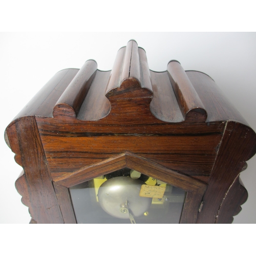 516 - A mid Victorian rosewood bracket clock and bracket