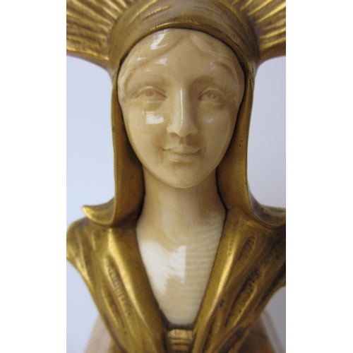 522 - A gilt bronze and carved ivory female bust