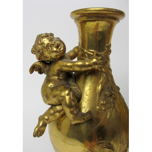 523 - A pair of gilt metal vases modelled after August Moreau