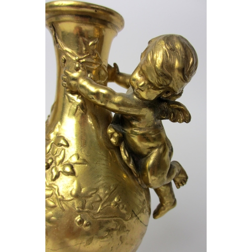 523 - A pair of gilt metal vases modelled after August Moreau