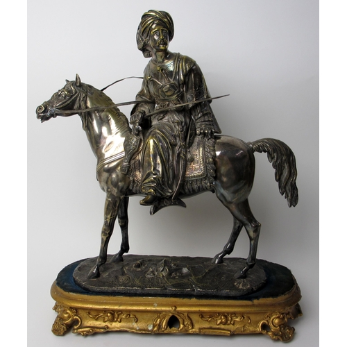 526 - An electroplated metal model of a Turkish military horseman