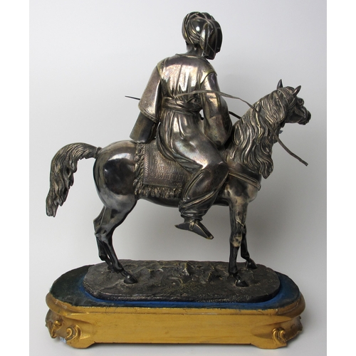 526 - An electroplated metal model of a Turkish military horseman