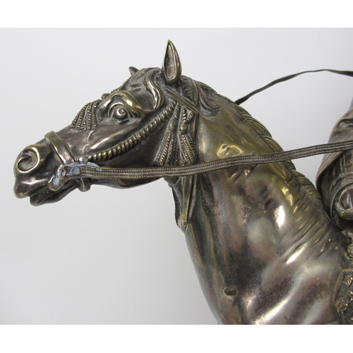 526 - An electroplated metal model of a Turkish military horseman