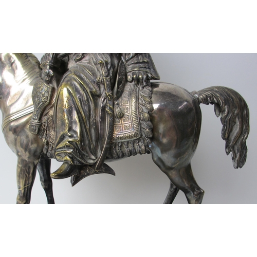 526 - An electroplated metal model of a Turkish military horseman