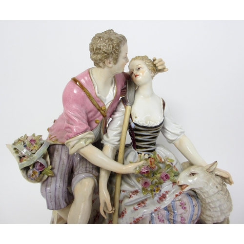 554 - A Meissen group of a courting couple