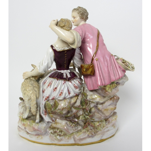 554 - A Meissen group of a courting couple