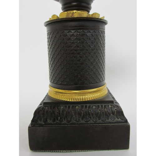 559 - A bronze and gilt metal two handled incense burner and cover