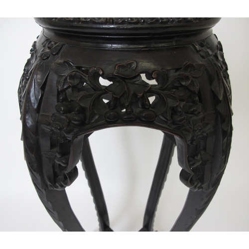 604 - A 19th century Chinese hardwood plant pedestal