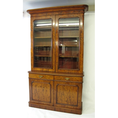 605 - A Victorian mahogany bookcase on chiffonier base