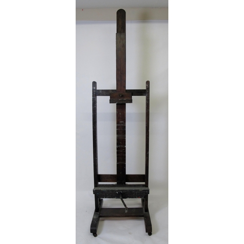 609 - A late Victorian oak adjustable artist's easel