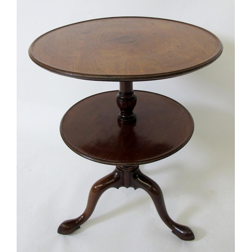 612 - A George III mahogany circular two tier dumb waiter