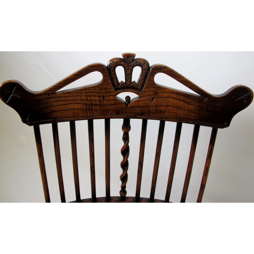 626 - A 19th century Windsor ash armchair