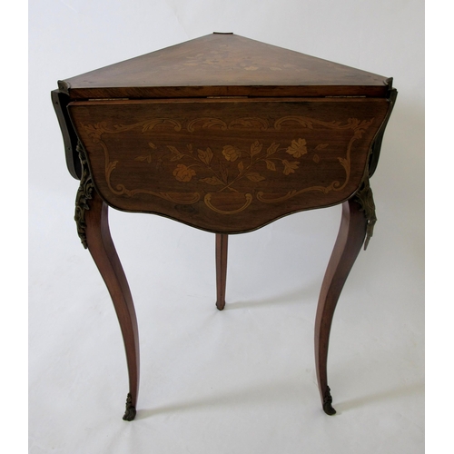 627 - A late 19th / early 20th century Louis XV style corner table