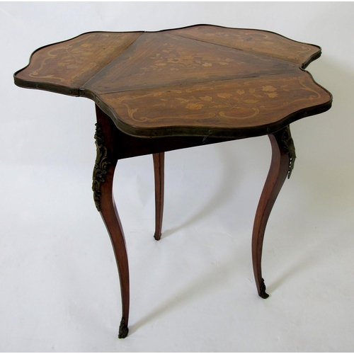 627 - A late 19th / early 20th century Louis XV style corner table