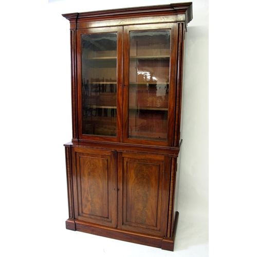 643 - A Victorian mahogany bookcase on a chiffonier base