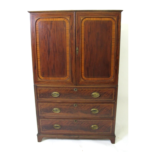 644 - An Edwardian mahogany inlaid linen press in the Sheraton style