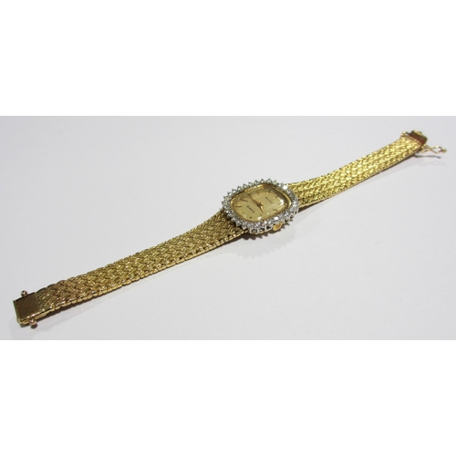 70 - A ladies 14kt gold diamond wrist watch by Bulova