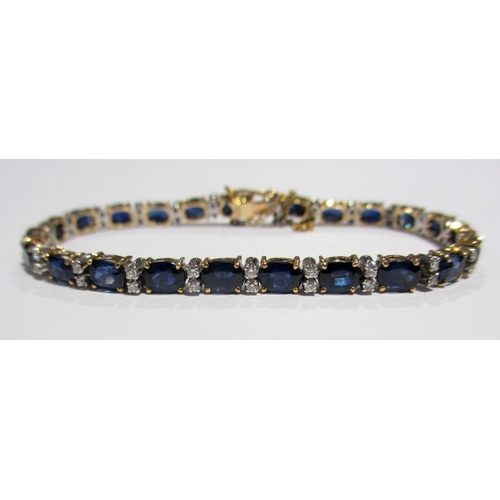 73 - A sapphire and diamond line bracelet