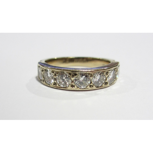 75 - A good diamond half hoop eternity ring