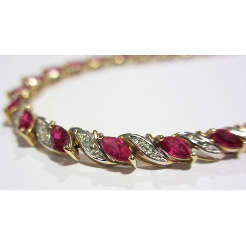 76 - A ruby and diamond line bracelet