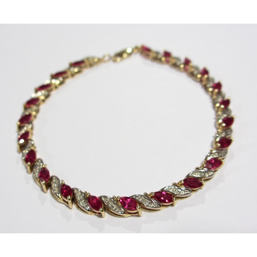 76 - A ruby and diamond line bracelet