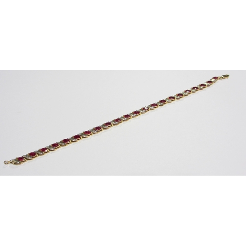 76 - A ruby and diamond line bracelet