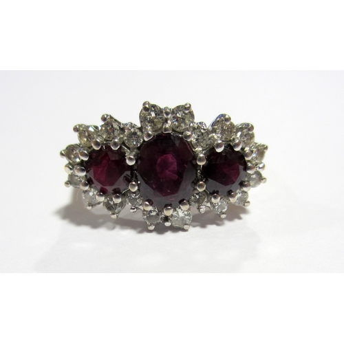 79 - A ruby and diamond cluster ring