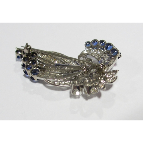 80 - A fine sapphire and diamond spray brooch