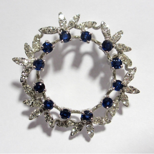 92 - An attractive sapphire and diamond brooch